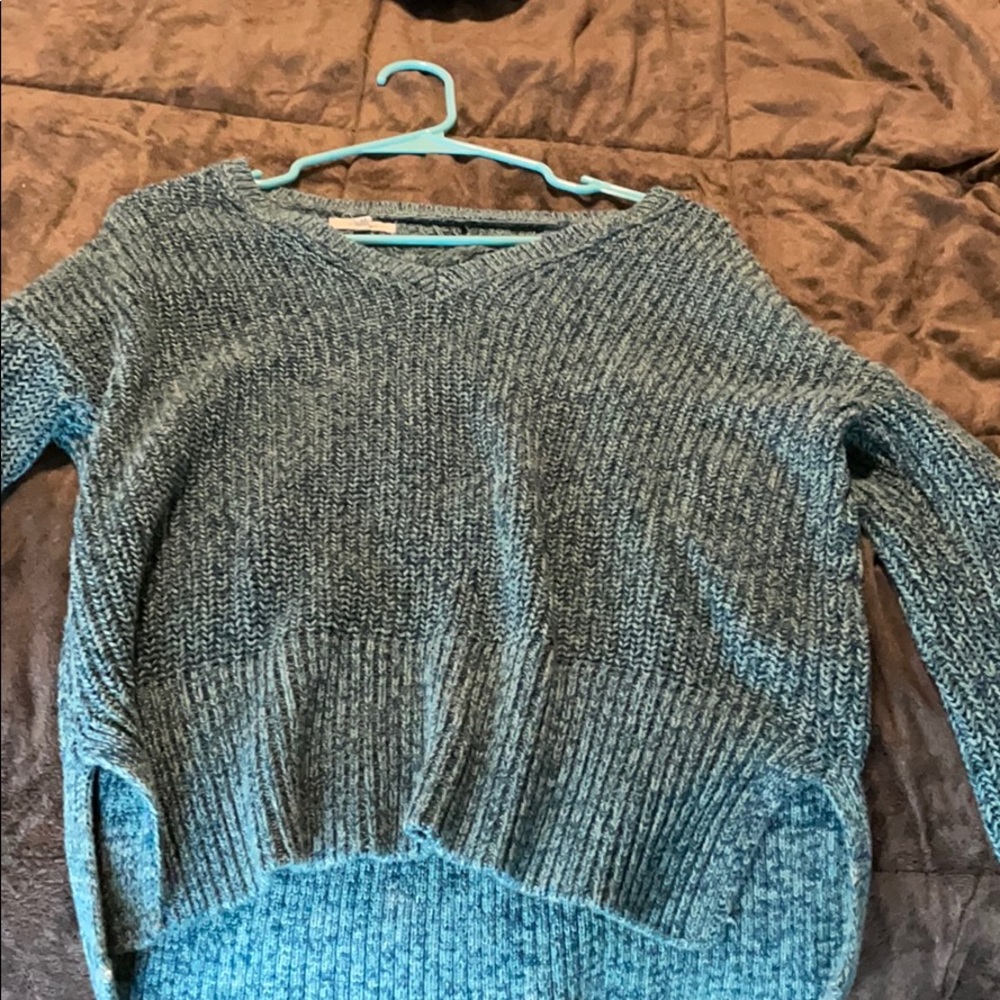 Brand new teal/blue open back sweater.